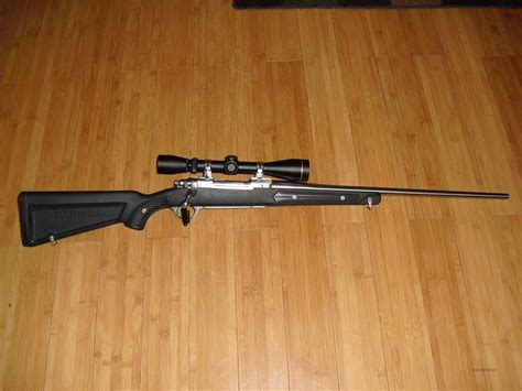 Ruger M77 Zytel or Boat Paddle or Skeleton Stock All Weather 100 Stainless Steel in good condition with wooden inserts. . Ruger skeleton stock production years